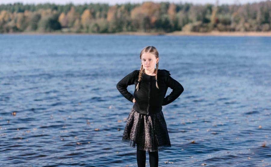 Saga Vanecek poses in front of the lake where she found the sword