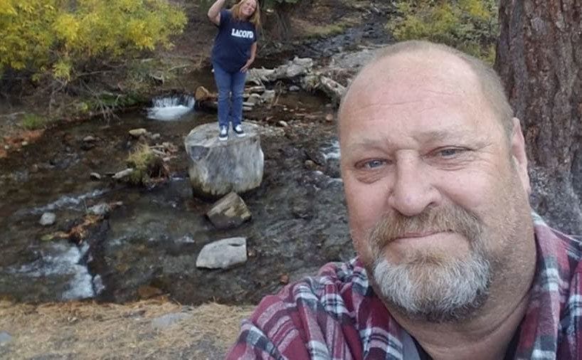 Loren and his wife hiking