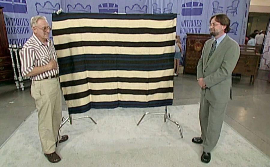 A photograph of them with the blanket on Antiques Roadshow