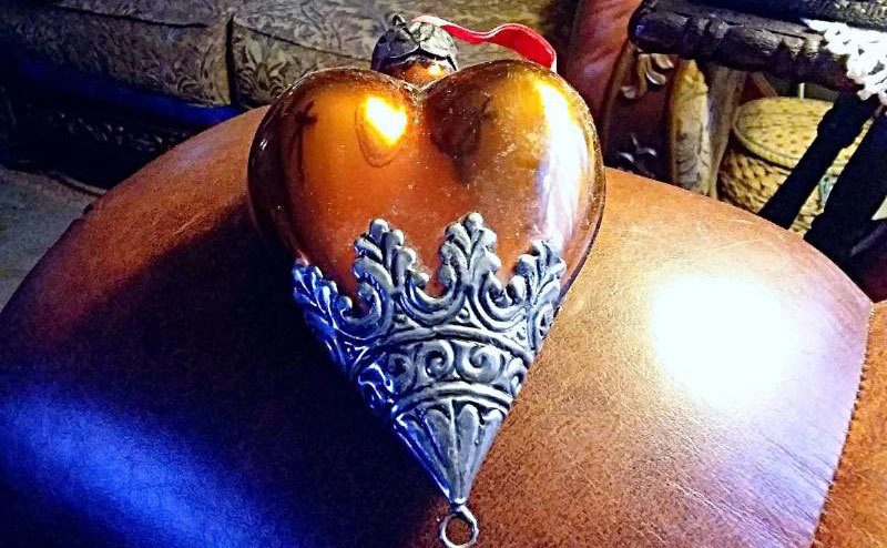 Another heart-shaped ornament in yellow with silver 