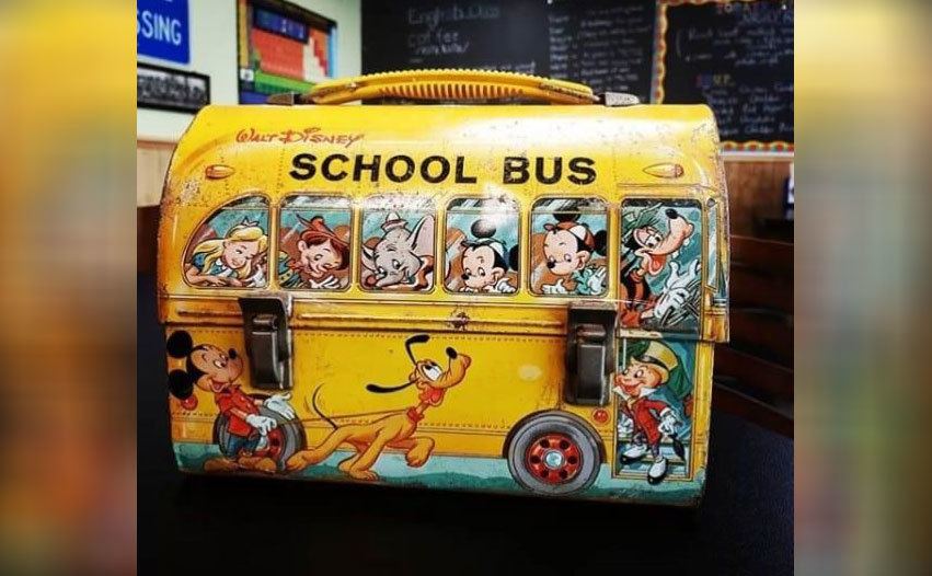 Vintage lunch box in school bus shape