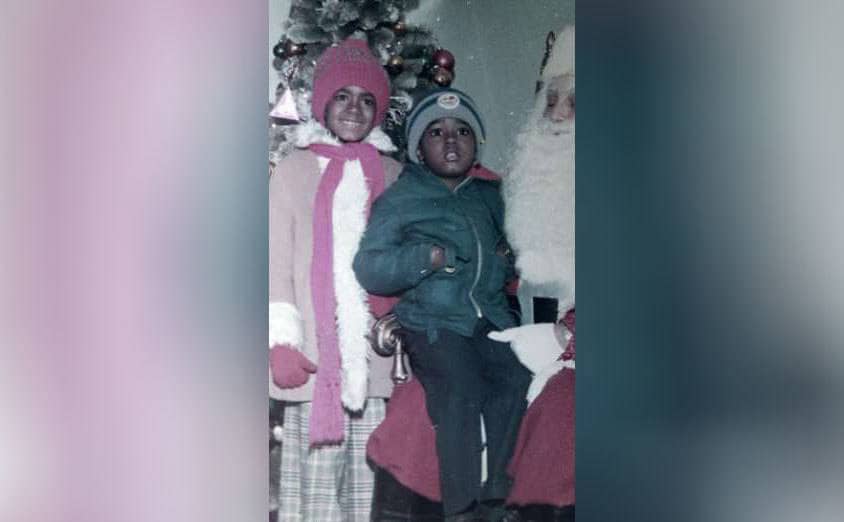 Rita and Richard Jr dressed for cold weather sitting on Santa’s lap 