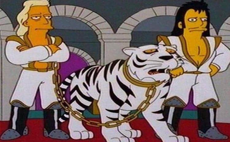 A scene from the Simpsons with Siegfried and Roy with their tiger 