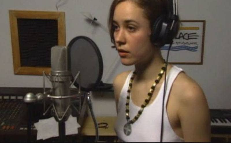 Rebecca Blasband recording in a studio 