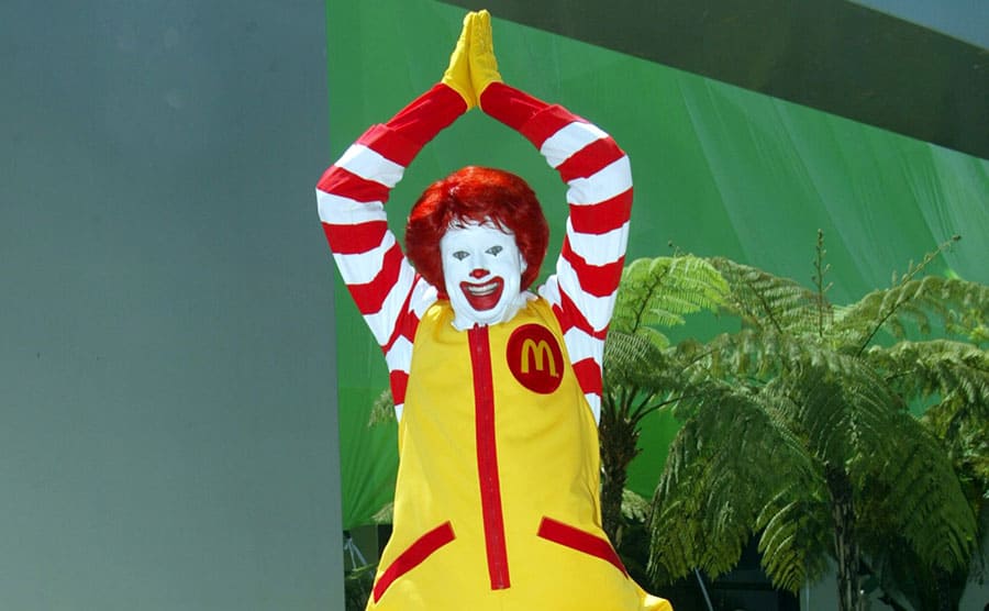Ronald McDonald leaping in the air 