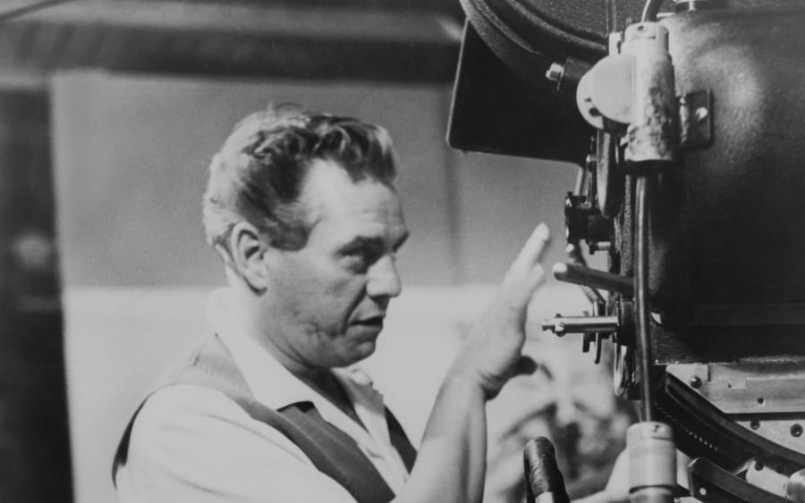 Desi Arnaz at a camera as executive producer of I LOVE LUCY TV series from 1952-57