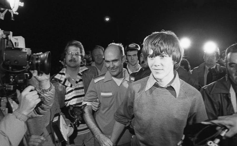 Steven Stayner walking through a bunch of press