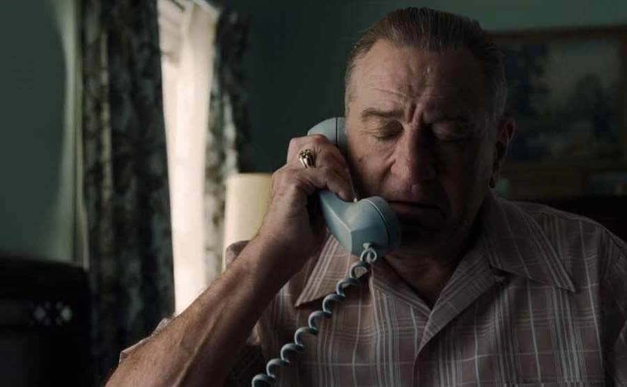 Robert DeNiro as Frank Sheeran on the phone in The Irishman 