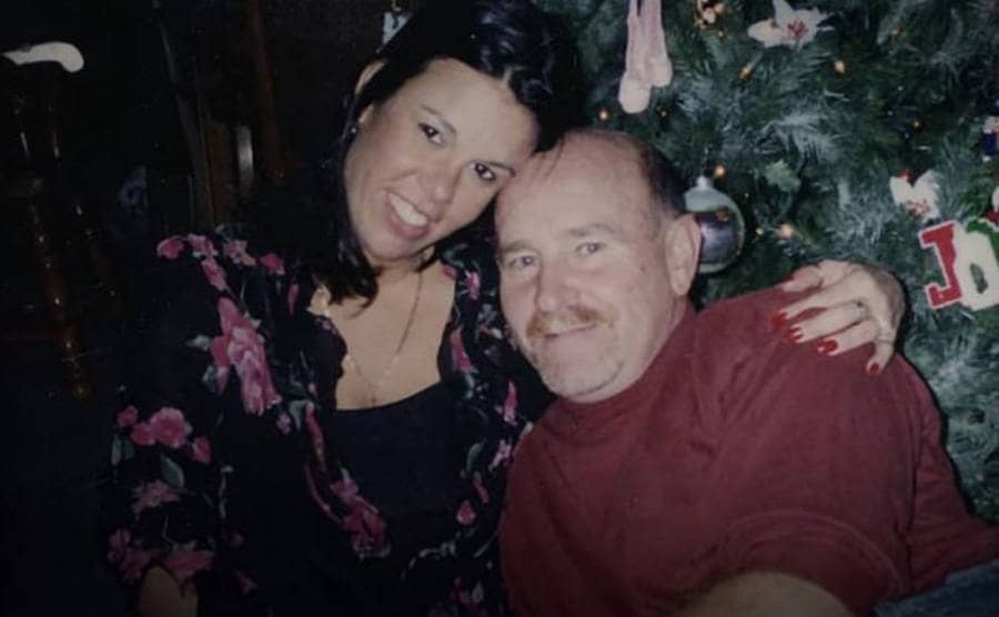 Patrice and Rob Endres photographed next to a Christmas tree before Patrice went missing 