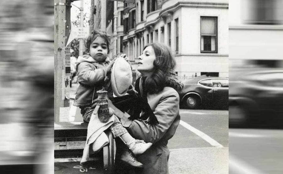 David Blaine as a young boy being held by his mother 