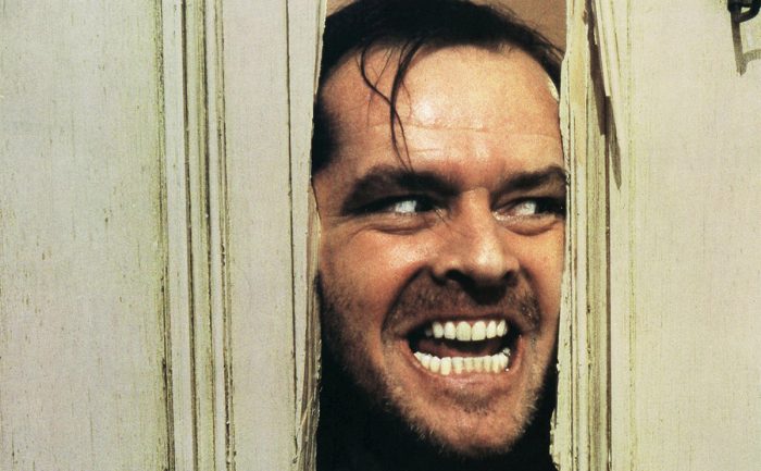 Jack Nicholson in the Shining peeking in through a door 