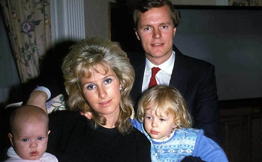 Kathy Hilton with Richard, Nicky, and Paris, posing for the camera 
