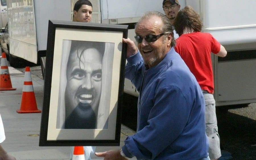 Jack Nicholson holding a picture of himself in 'The Shining.'