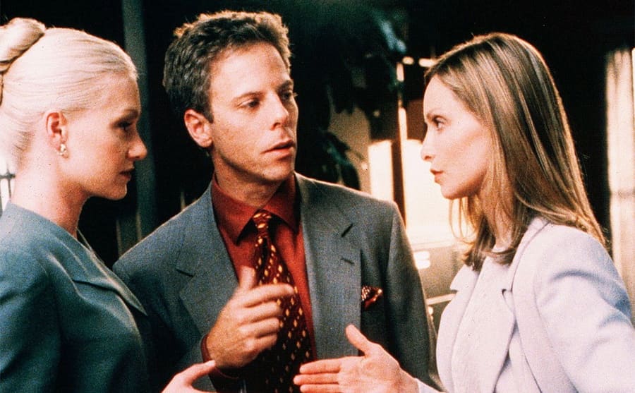 Greg Germann with Portia De Rossi and Calista Flockhart in a scene from Ally McBeal 