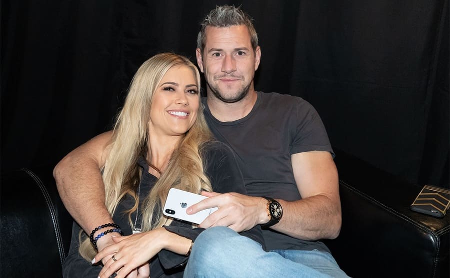 Christina and Anthony Anstead posing backstage at an event in Texas 2018 