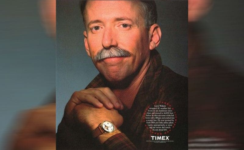Larry wearing a Timex watch in the magazine ad 