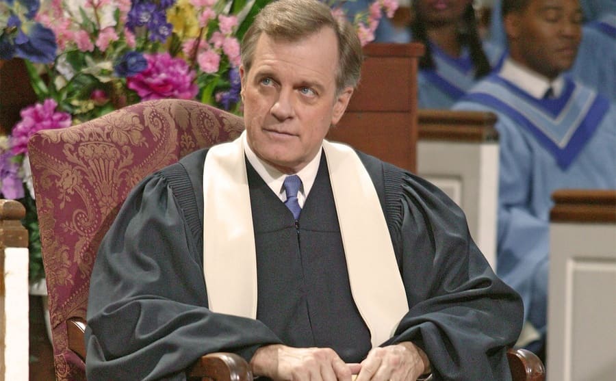 Stephen Collins dressed as a reverend sitting in church on 7th Heaven 