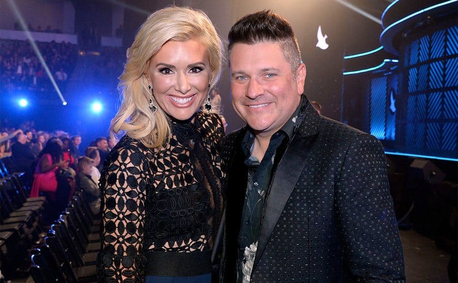 Allison Alderson DeMarcus and Jay DeMarcus smiling and hugging
