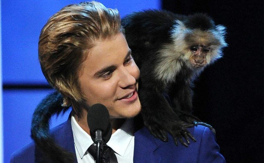 Justin Biever with his pet monkey at his comedy central roast 