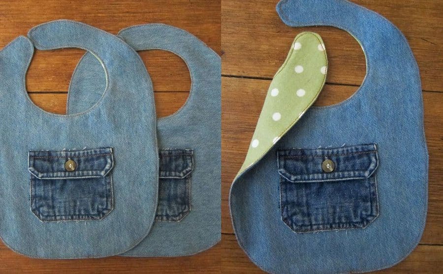 Two denim bibs with a small pocket on them / The denim bib with a strap folded over to reveal light green polka dotted fabric 
