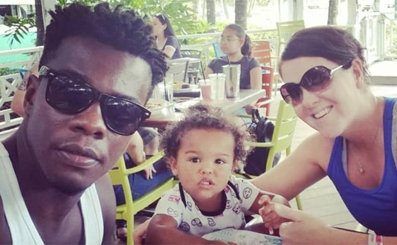 Devar and Melanie with her son Hunter at a restaurant 
