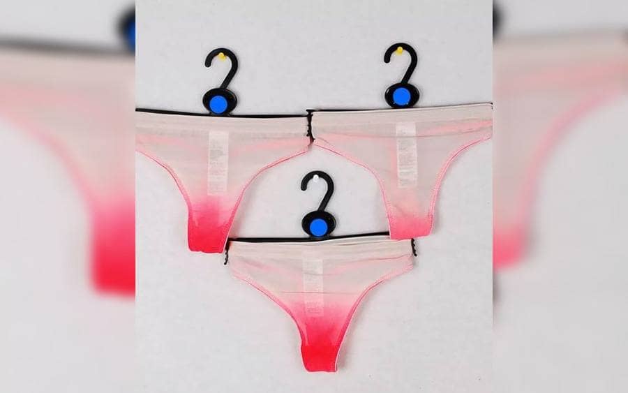 Women's panties with red stains on the bottom