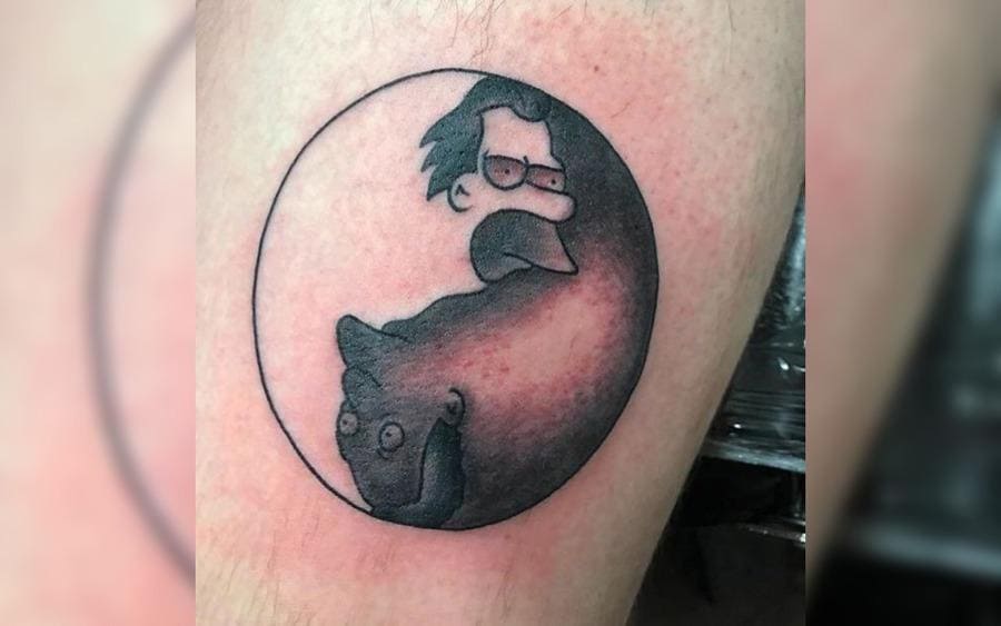 A Yin Yang tattoo with the Simpsons characters 