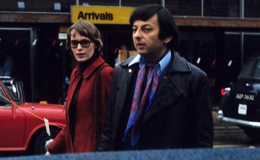 Mia Farrow and Andre Previn outside of the Arrivals gate at Heathrow Airport 
