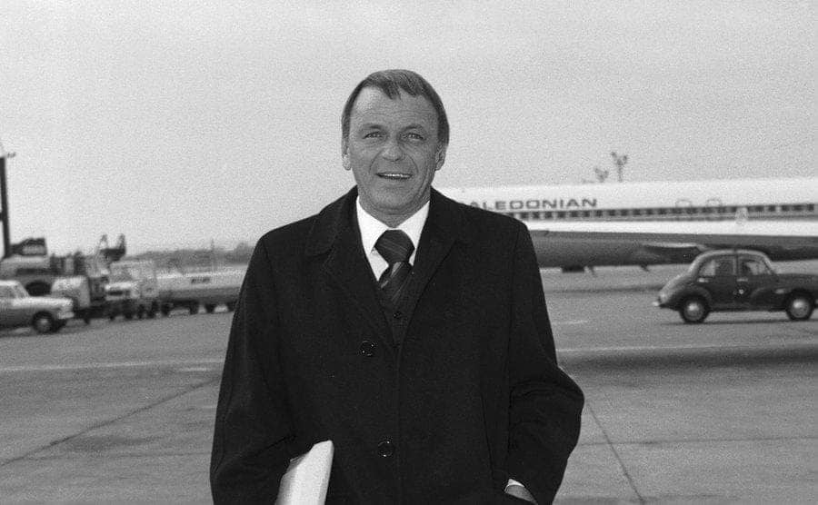 Frank Sinatra walking on the runway 