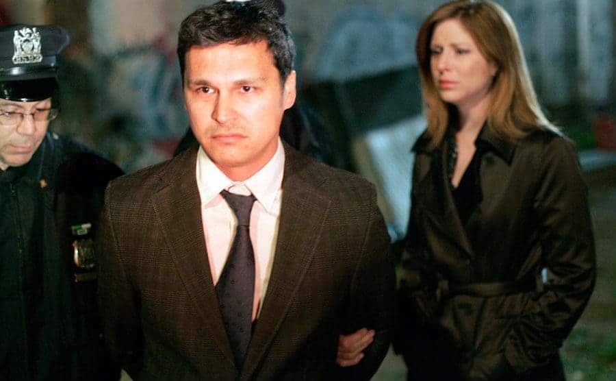 Adam Beach as Chester Lake being arrested in a scene from Law and Order 