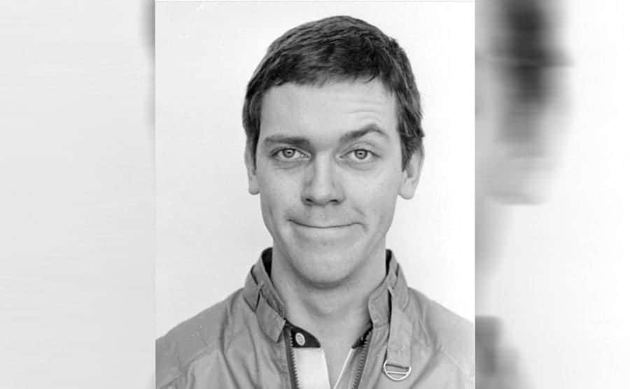 a young Hugh Laurie in a black and white photograph. 