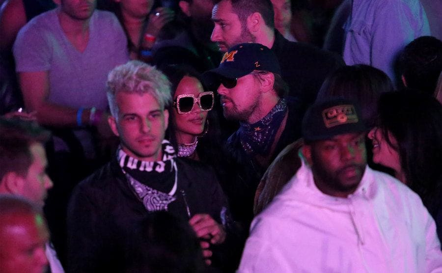 Singer Rihanna and actor Leonardo DiCaprio attend a concert.