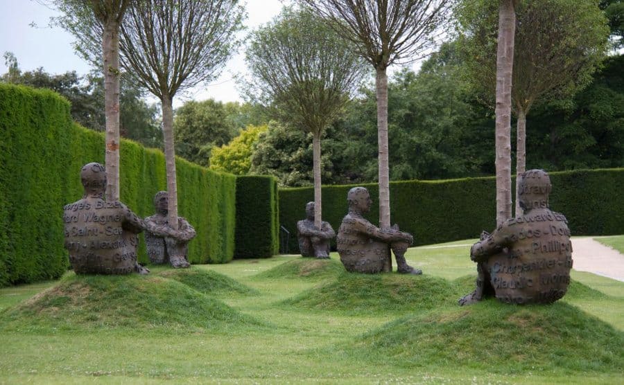Jaume Plensa Sculptures around a tree