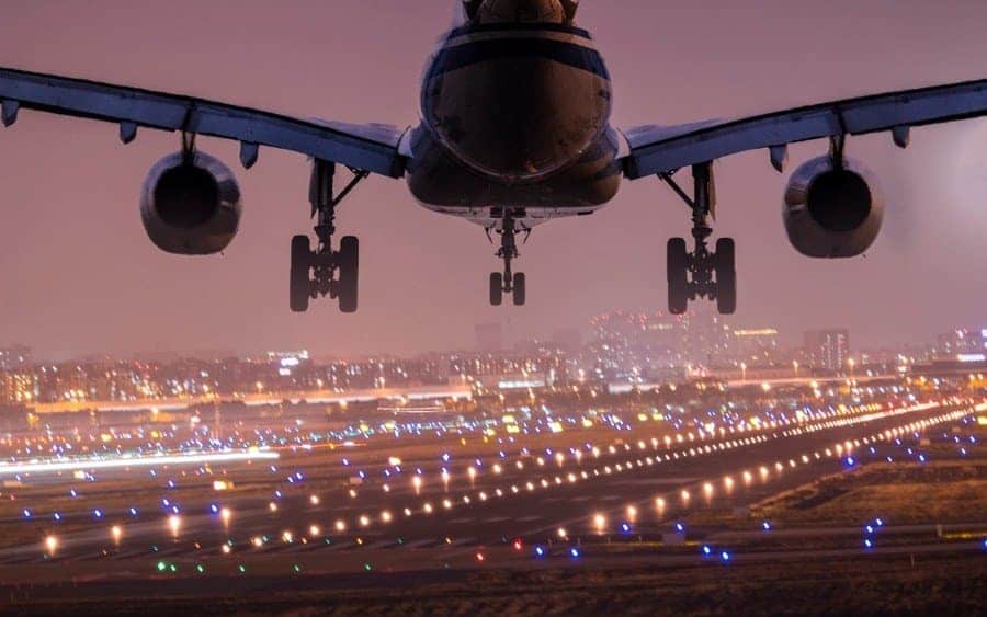 airplane landing the shanghai airport in the night