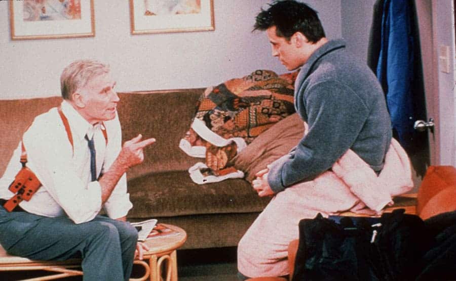 Charlton Heston talking to Matt LeBlanc in a scene from Friends 