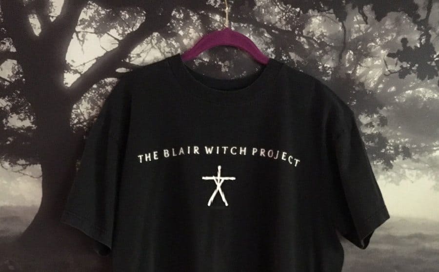 A vintage “The Blair Witch Project” t-shirt on a hanger.