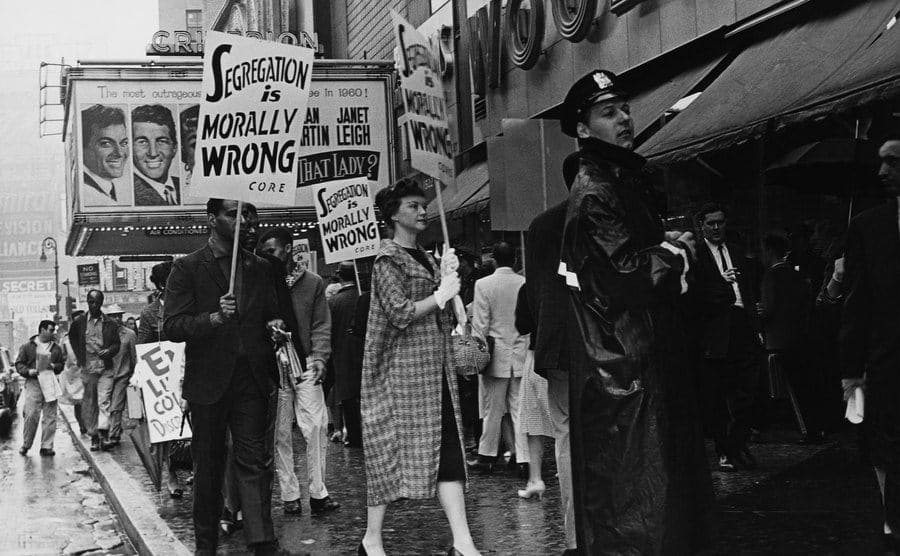 A demonstration against racial segregation outside of a Woolworths store 1960