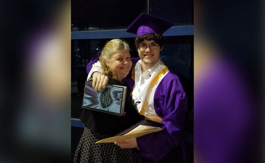 Shana Williams is embracing her son at his high school graduation.