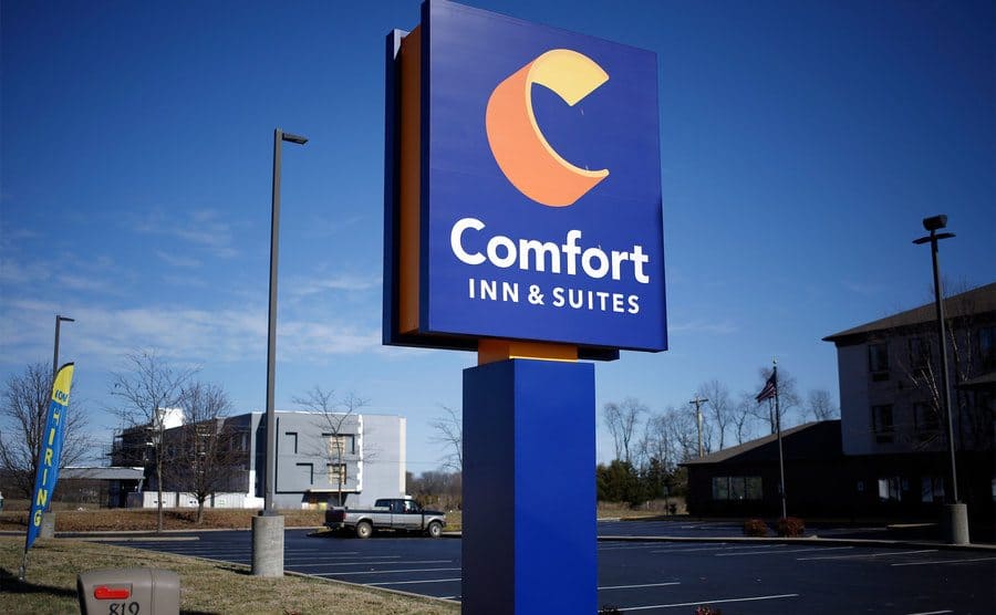 Signage is displayed outside a Comfort Inn & Suites hotel.