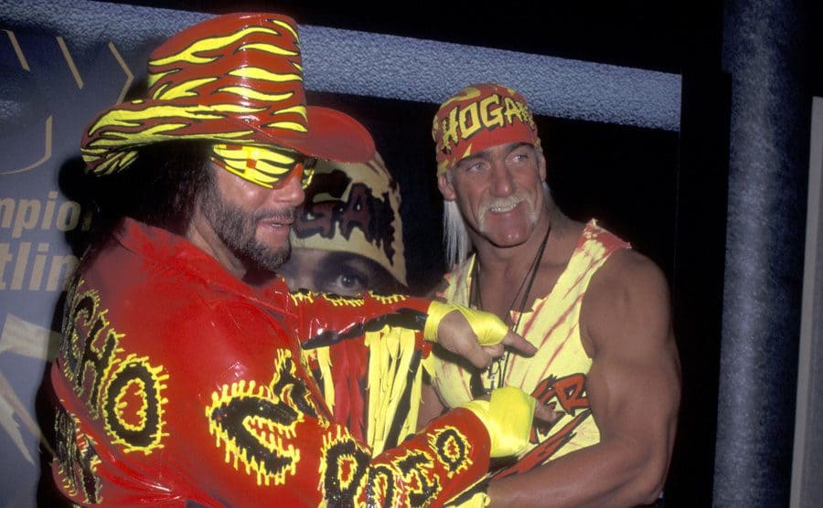 Randy Savage and Hulk Hogan posing together 