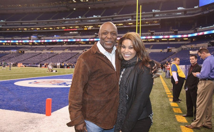 Singer Jordan Sparks with her father former NFL player Phillippi Sparks on the sidelines before the start of the 2010 AFC Championship Game.