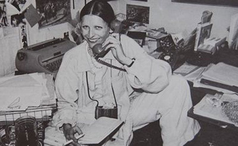 Ingeborg Day is talking on the phone as she sits in her office. 