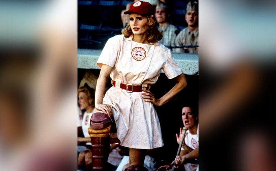 Geena Davis standing in the dugout in a scene from “A League of Their Own” 