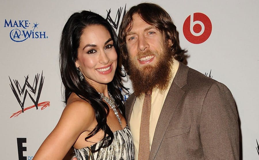 Brie Bella and Daniel Bryan attend the WWE SummerSlam VIP party.