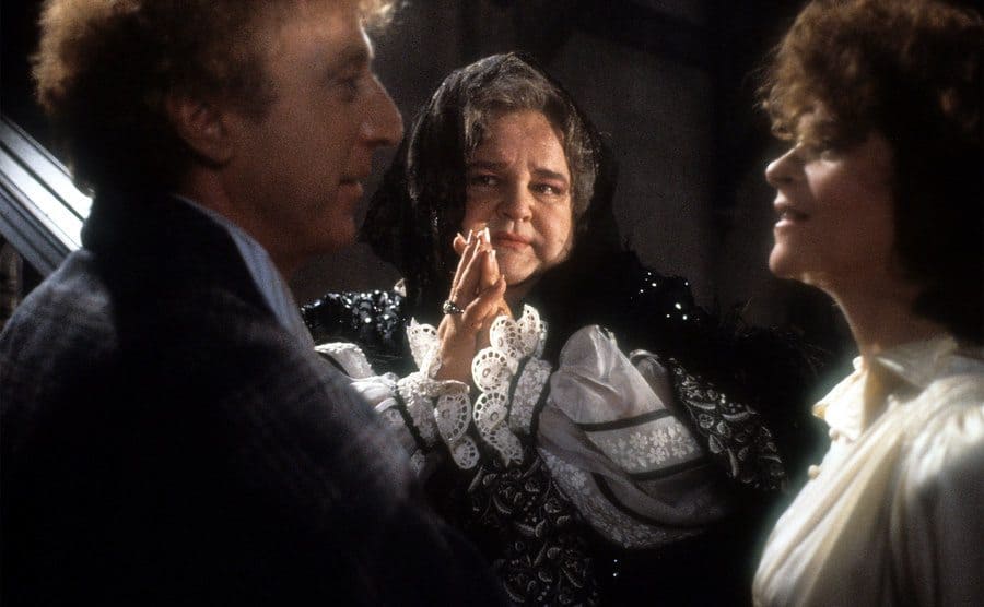 Gene Wilder, Dom DeLuise, and Gilda Radner in a scene from the film 'Haunted Honeymoon'.