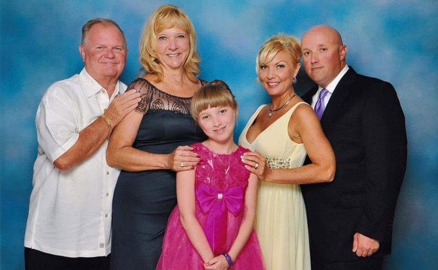 A photo of Kat, Jeff, Lola and Kats parents, John and Nancy. 