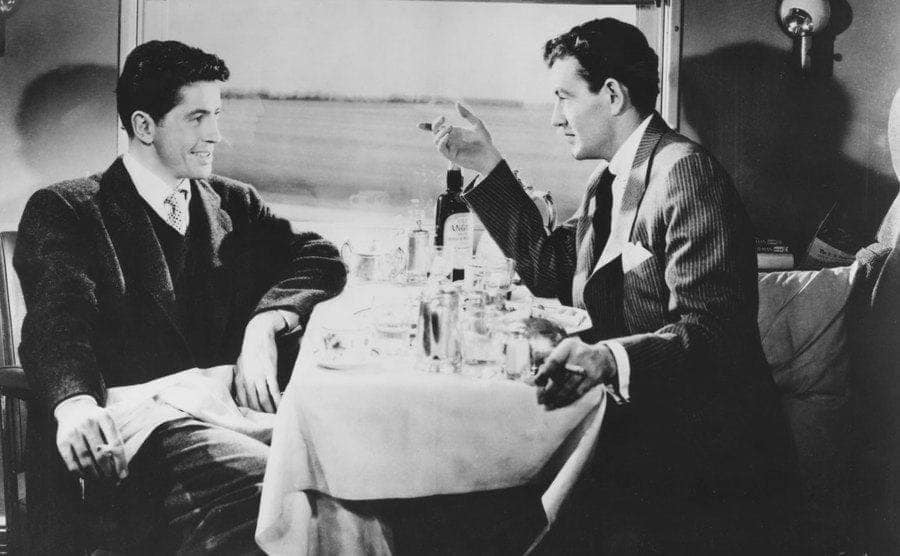 Farley Granger and Robert Walker act in Alfred Hitchcock’s film “Strangers on a Train”.
