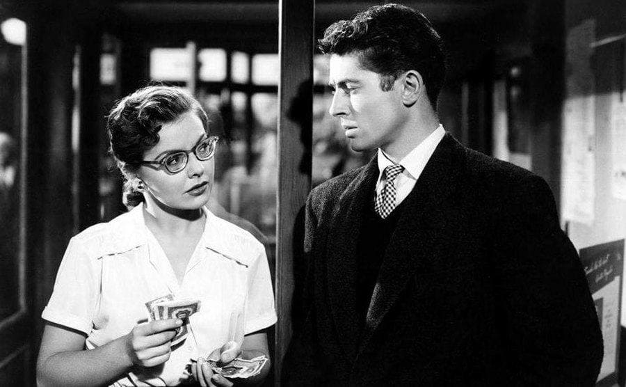 Farley Granger and Kasey Rogers, as Guy and Miriam Haines, in Hitchcock’s ‘Strangers on a Train”. 