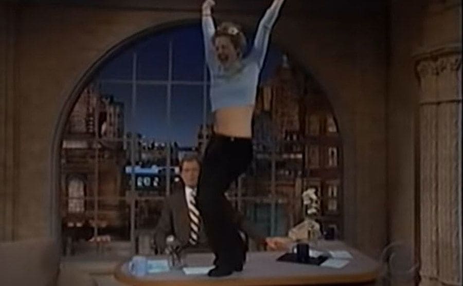 Drew Barrymore dancing on David Letterman’s desk during the ‘Late Show’ 