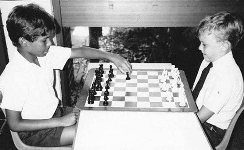 Heath Ledger competes in a chess tournament at a young age. 